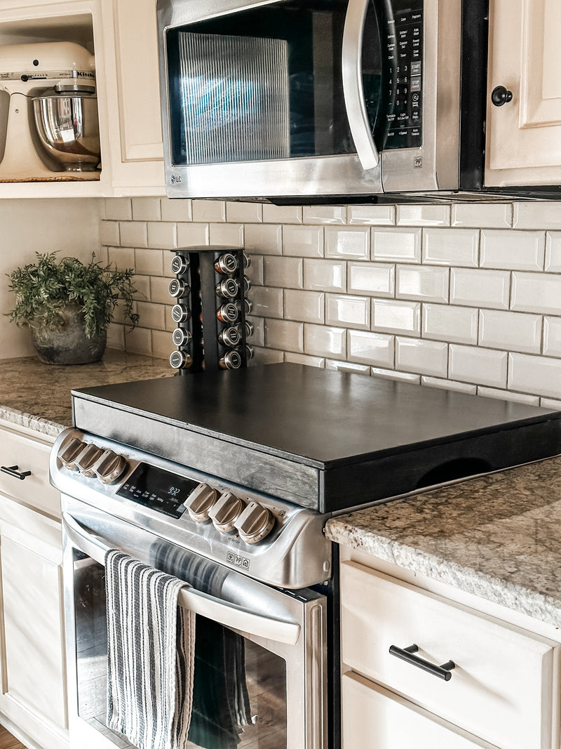 Clean and simple minimalist black stove cover