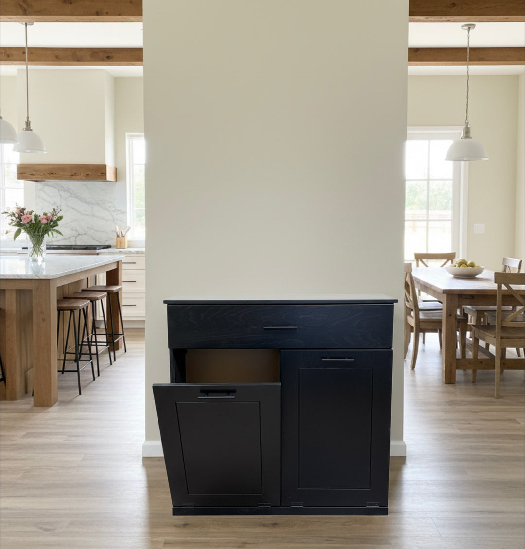 Free standing hidden trash cabinet with a storage drawer in black stain
