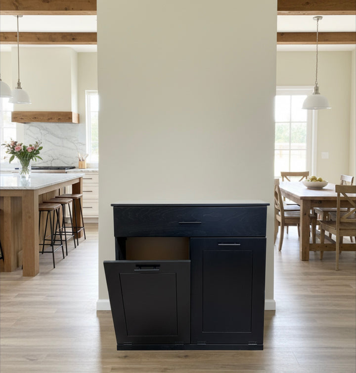 Free standing hidden trash cabinet with a storage drawer in black stain