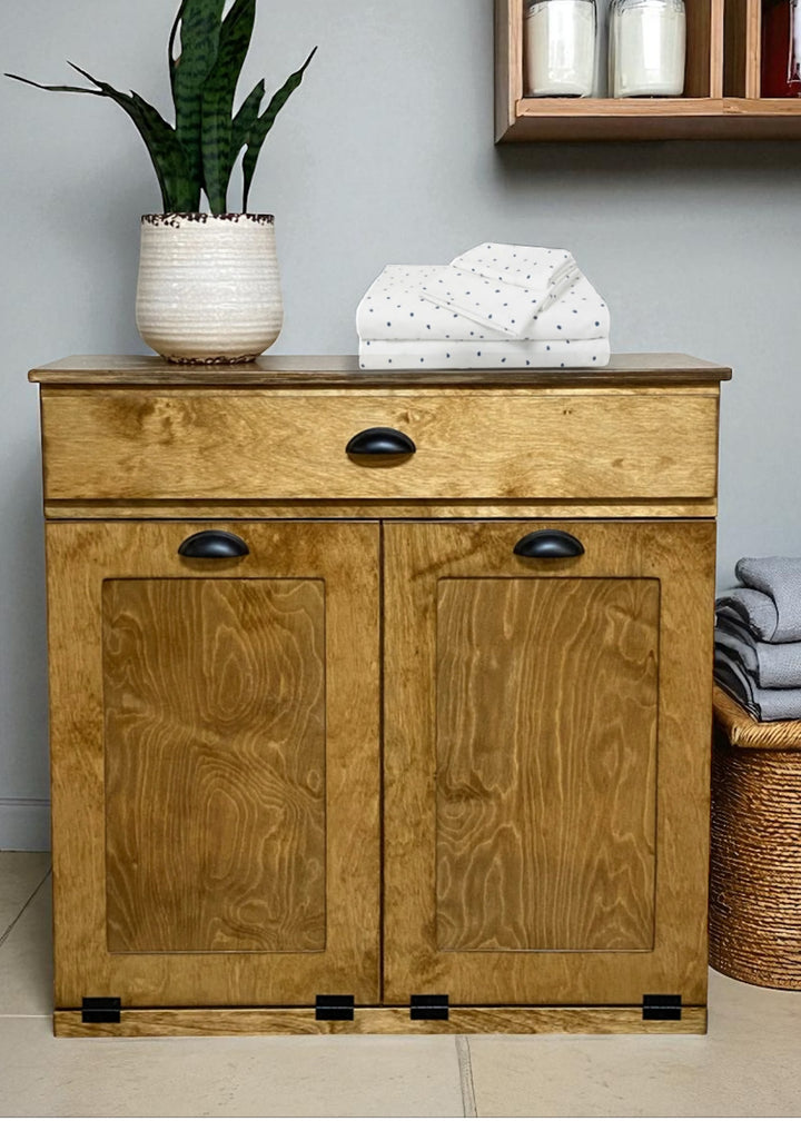 Double laundry with a storage drawer in golden oak counter high