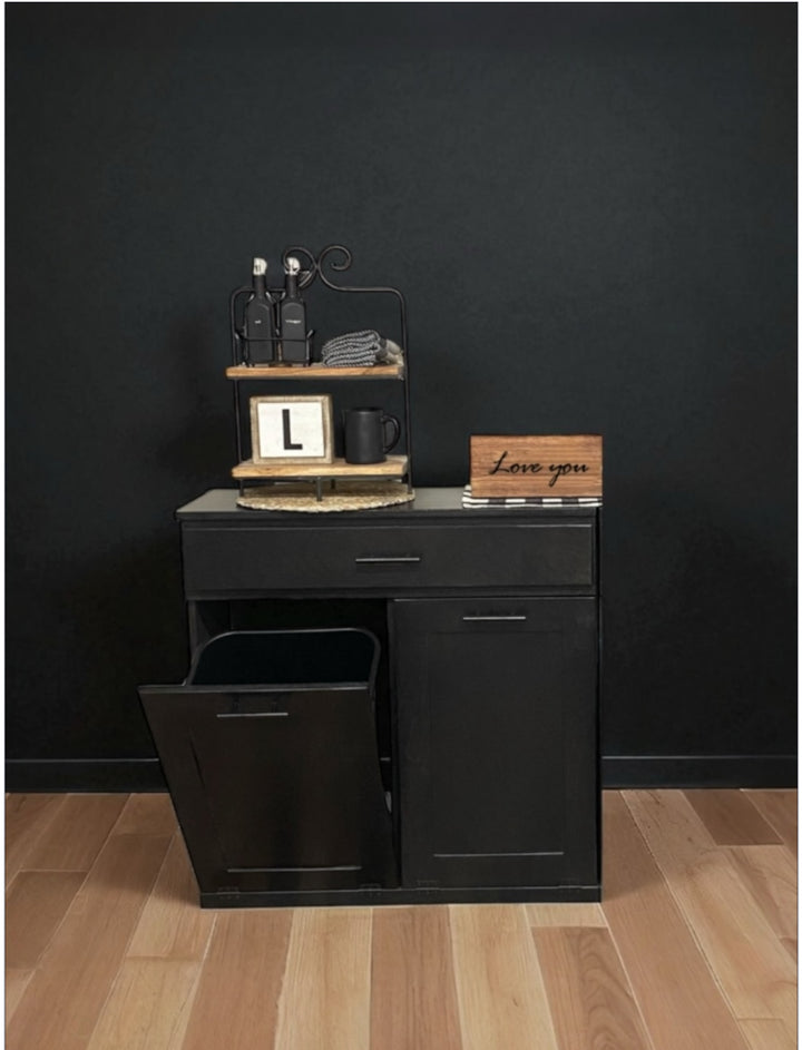 Free standing hidden trash cabinet with a storage drawer in black stain
