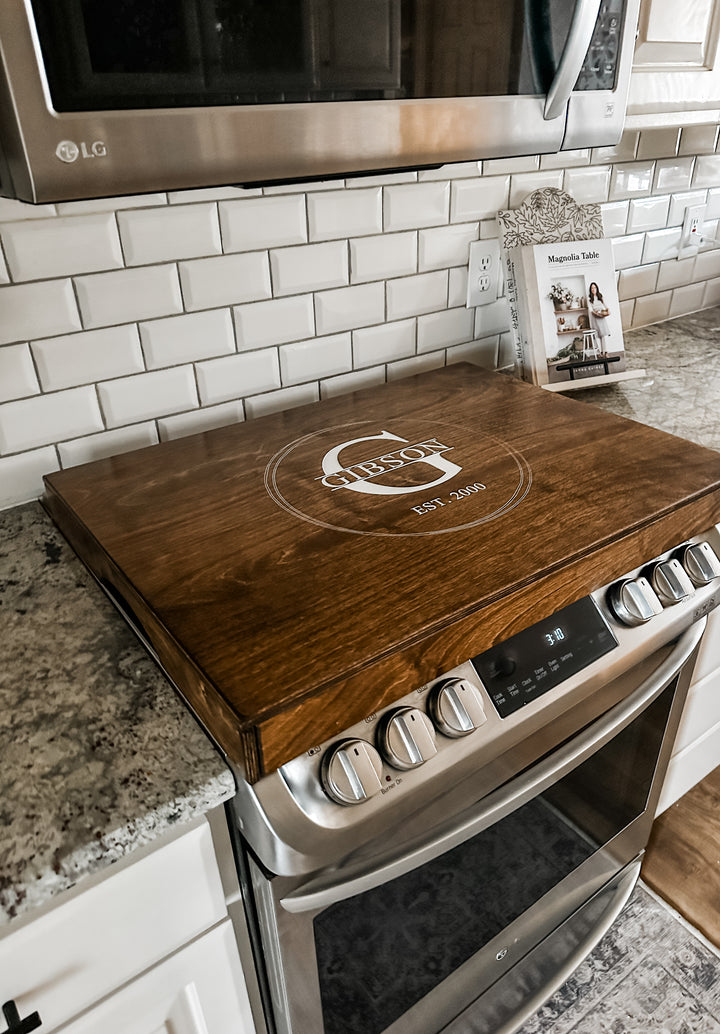 Personalized monogram stove cover, warm brown stain + soft white "Gibson"