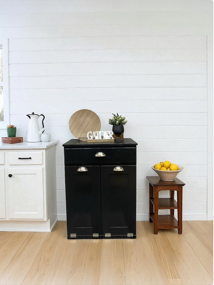 Slim style double trash cabinet with a storage drawer in black stain