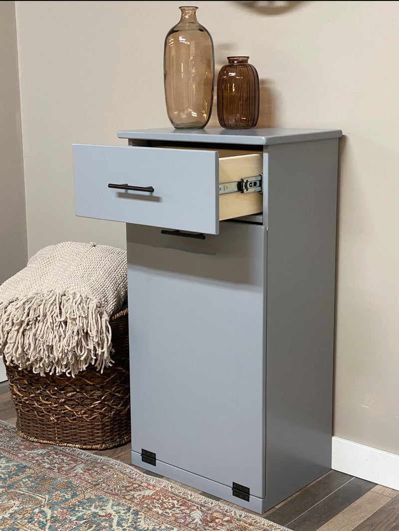 Sinclair with a storage drawer in gray modern door.