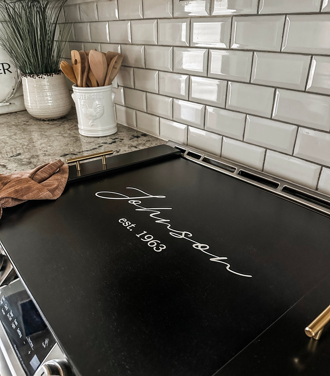 Personalized last name + est. date stove cover, black stain, "Johnson"