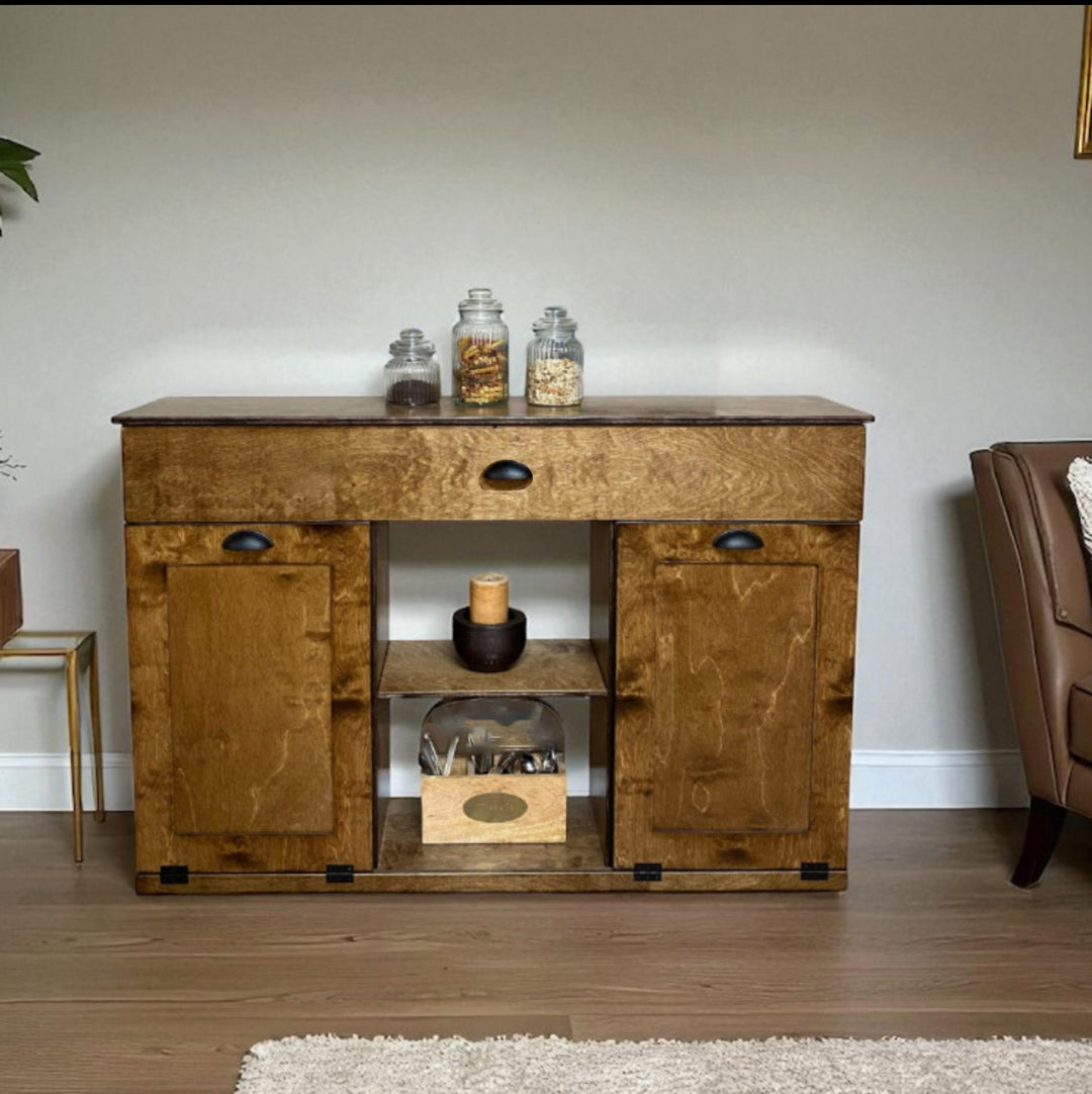 Triple tilt-out with a storage drawer and open shelving in warm brown stain