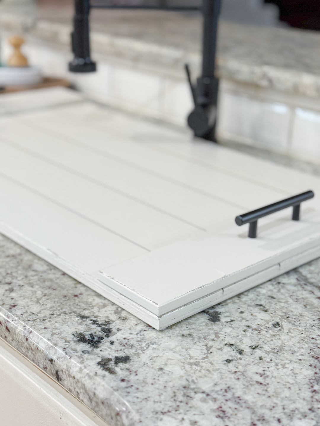 Distressed slatted sink cover in white