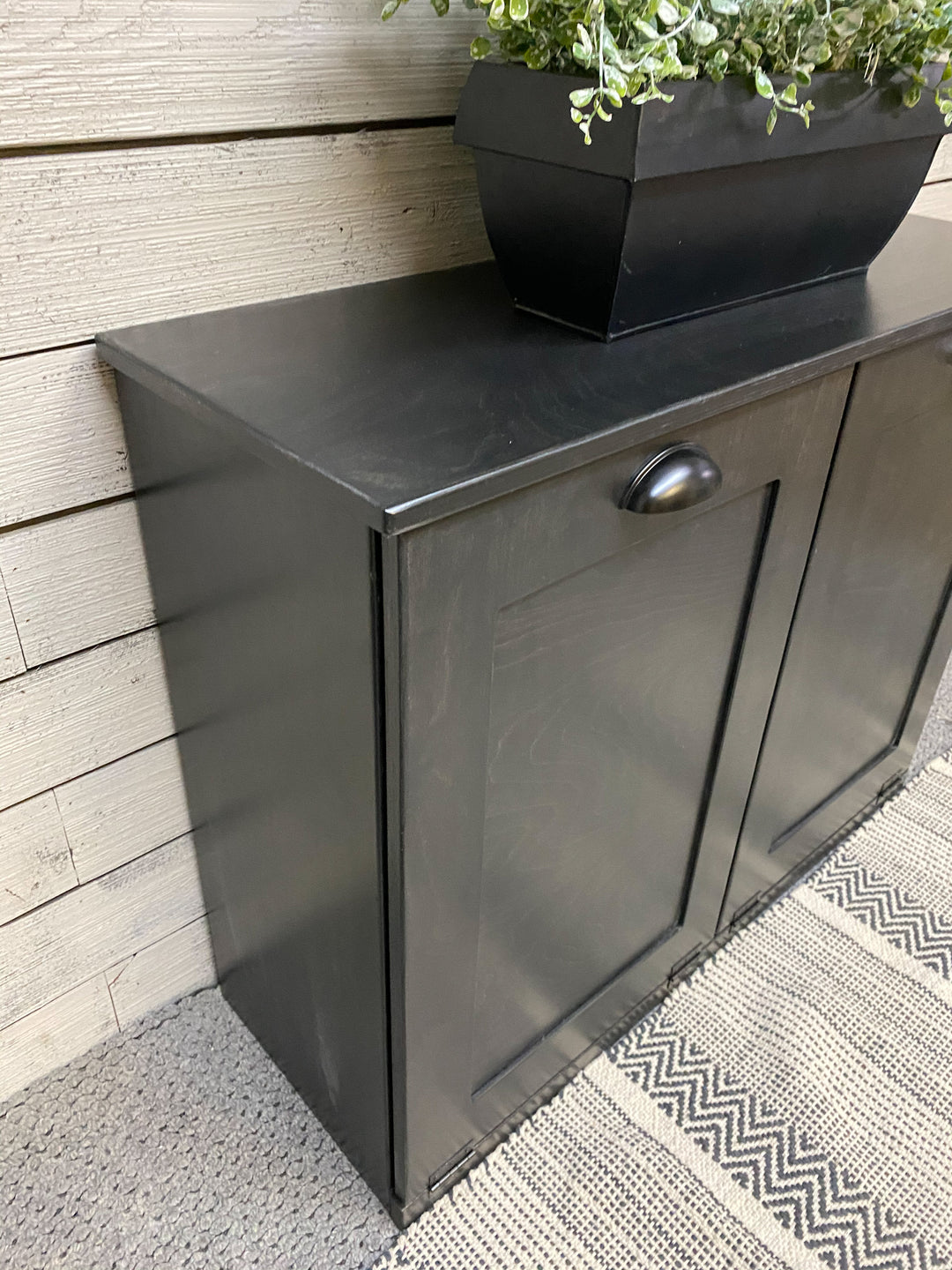 Double kitchen trash cabinet in black stain