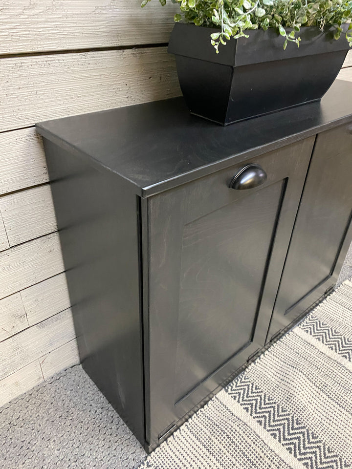 Double kitchen trash cabinet in black stain