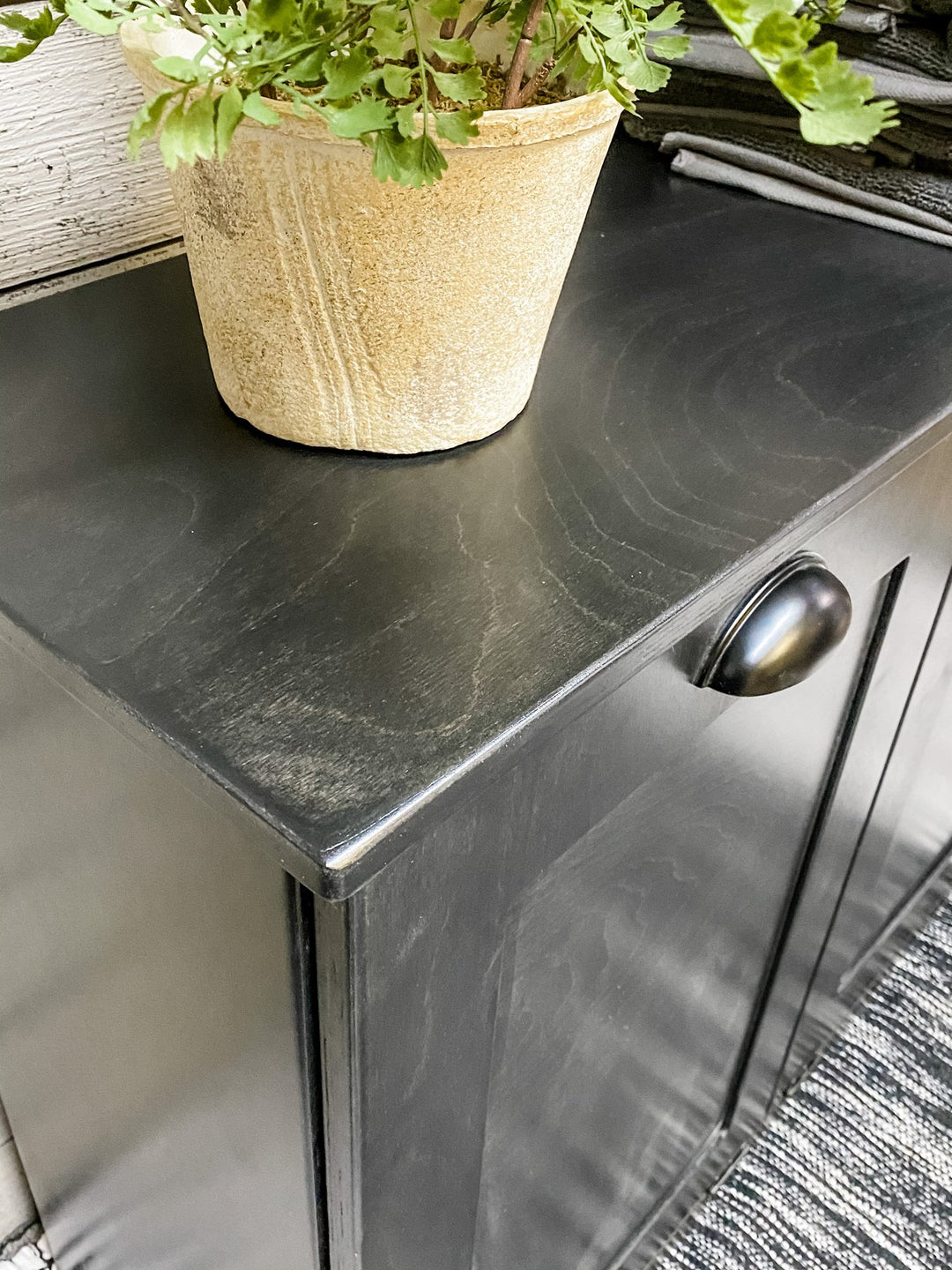 Double kitchen trash cabinet in black stain