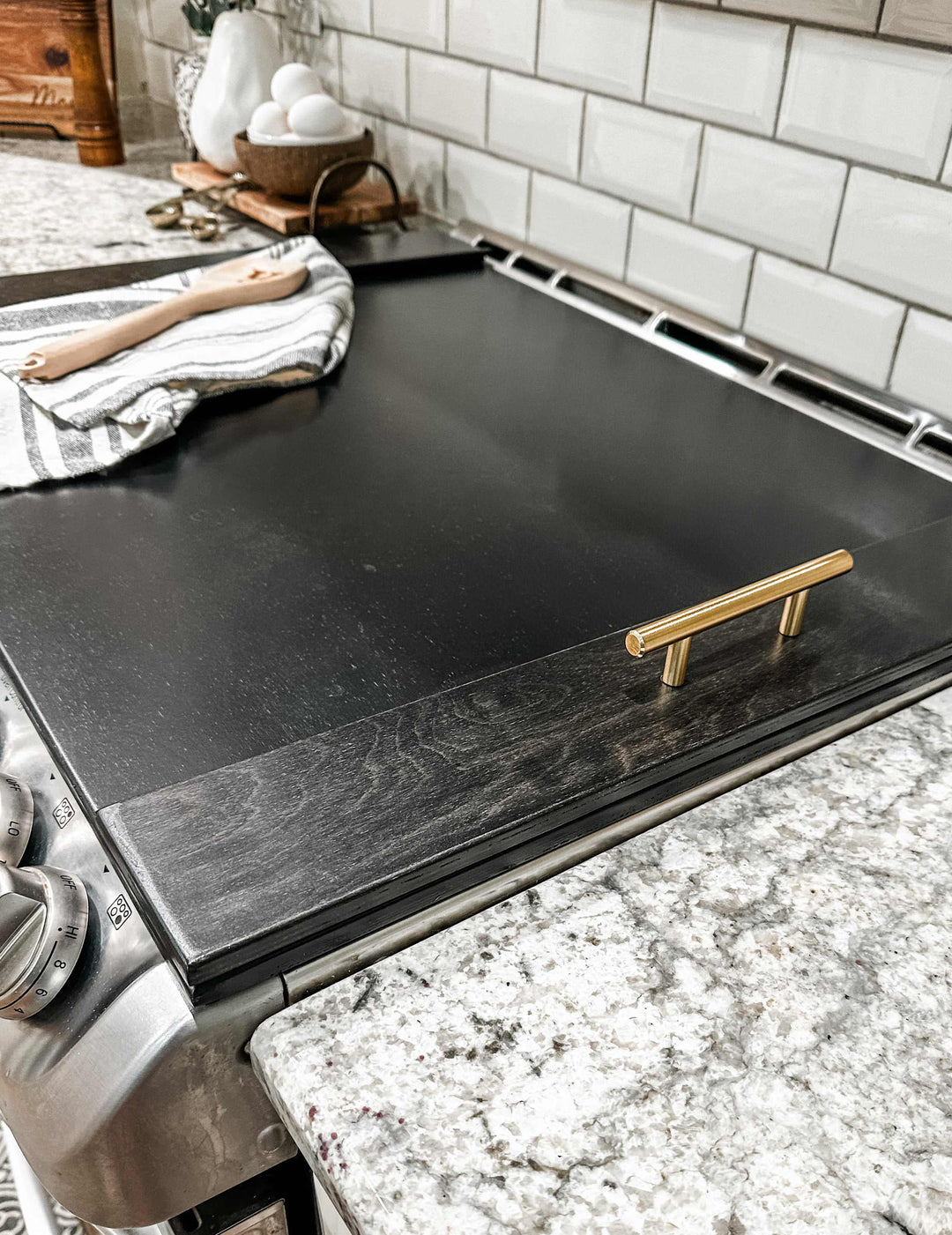 Clean and simple minimalist black stove cover