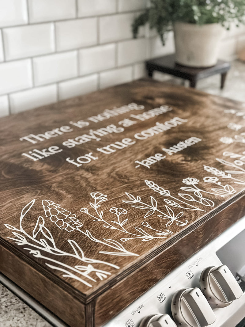 Jane austen stove cover with wildflowers, warm brown + white script