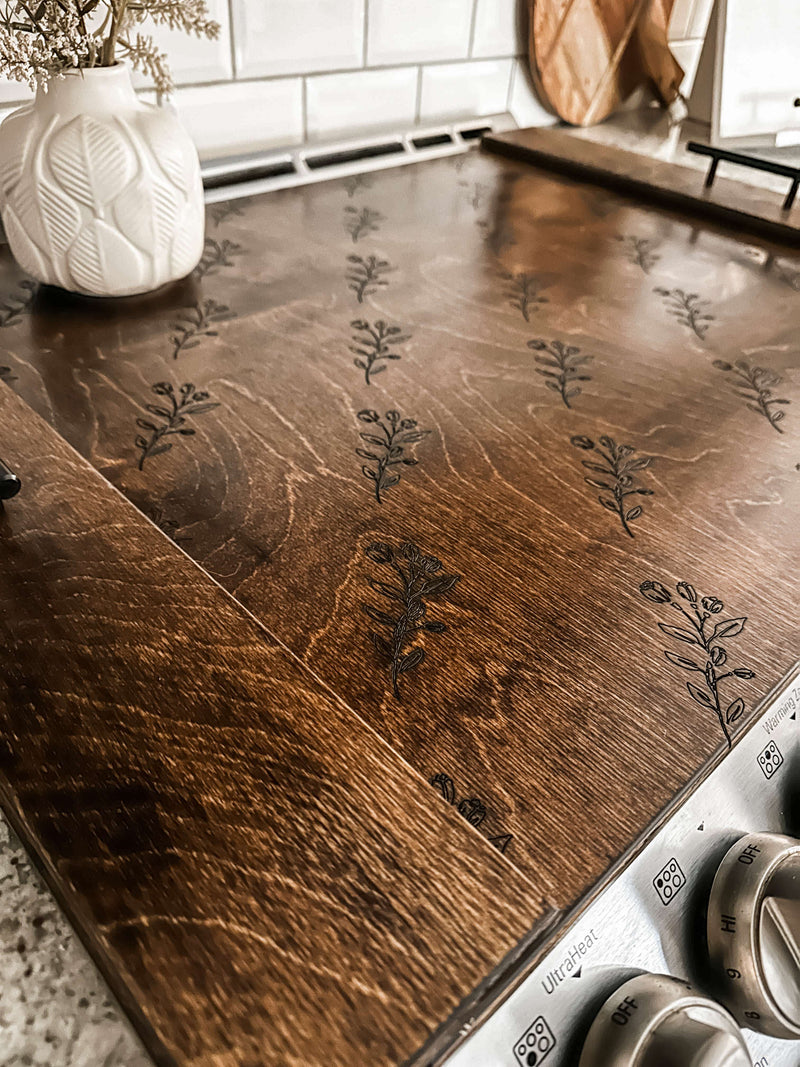 Floral pattern stove cover in warm brown