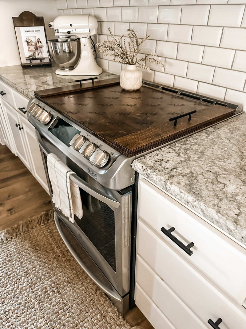 Floral pattern stove cover in warm brown