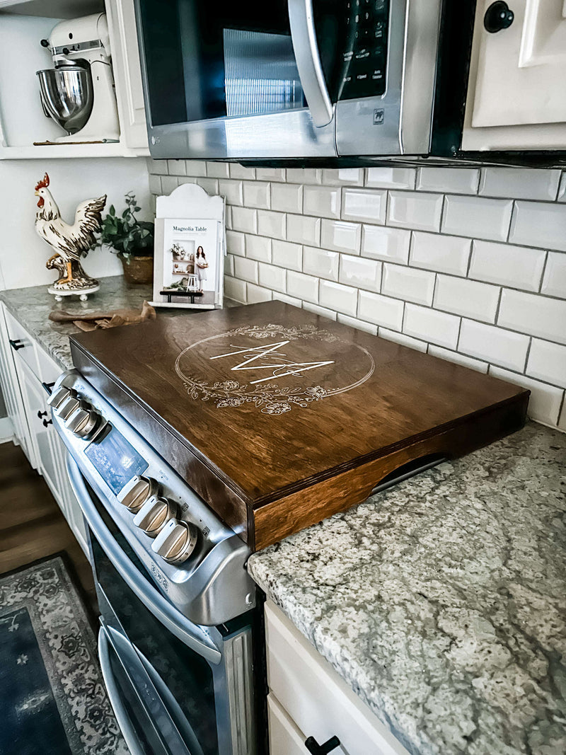 Personalized monogram stove cover, warm brown + white script "McKee"