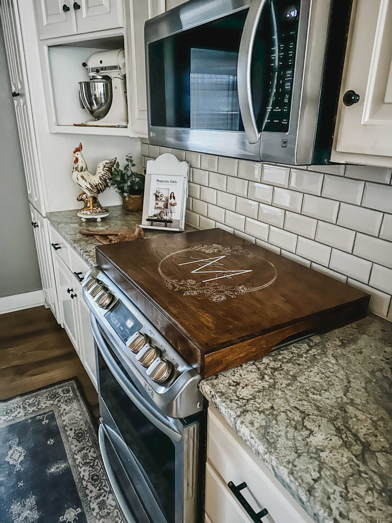 Personalized monogram stove cover, warm brown + white script "McKee"