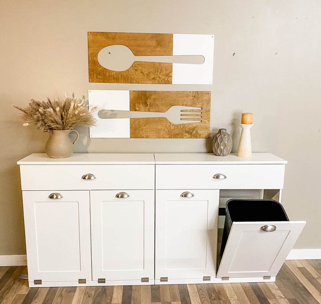 4 bin quad tilt out trash cabinet with a storage drawer in white