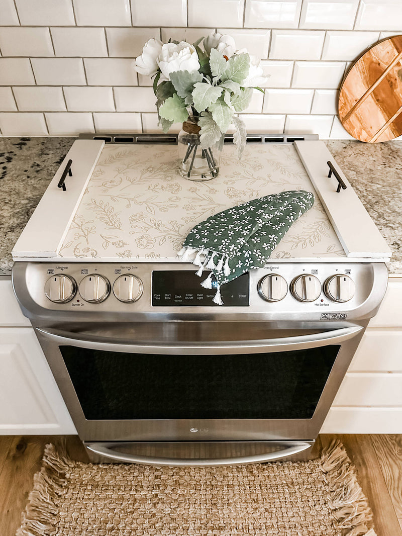 Engraved floral pattern stove cover, ivory distressed