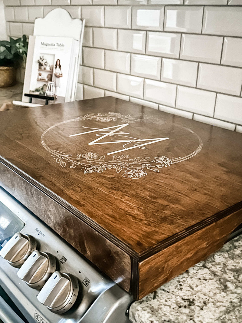 Personalized monogram stove cover, warm brown + white script "McKee"