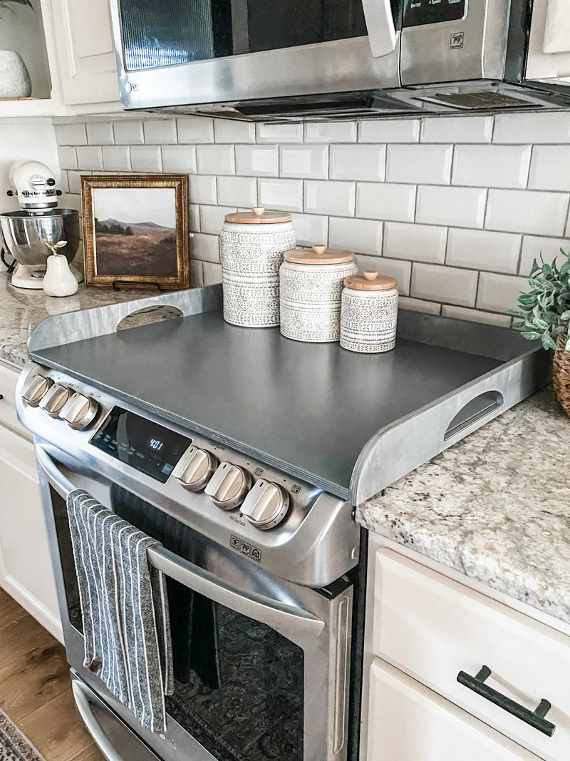 Clean and simple heather gray stove cover with raised edge