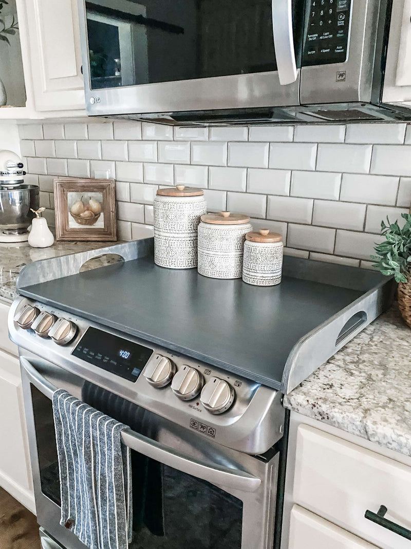 Clean and simple heather gray stove cover with raised edge