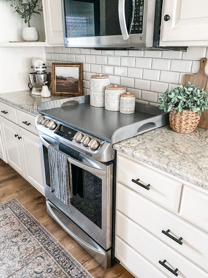 Clean and simple heather gray stove cover with raised edge