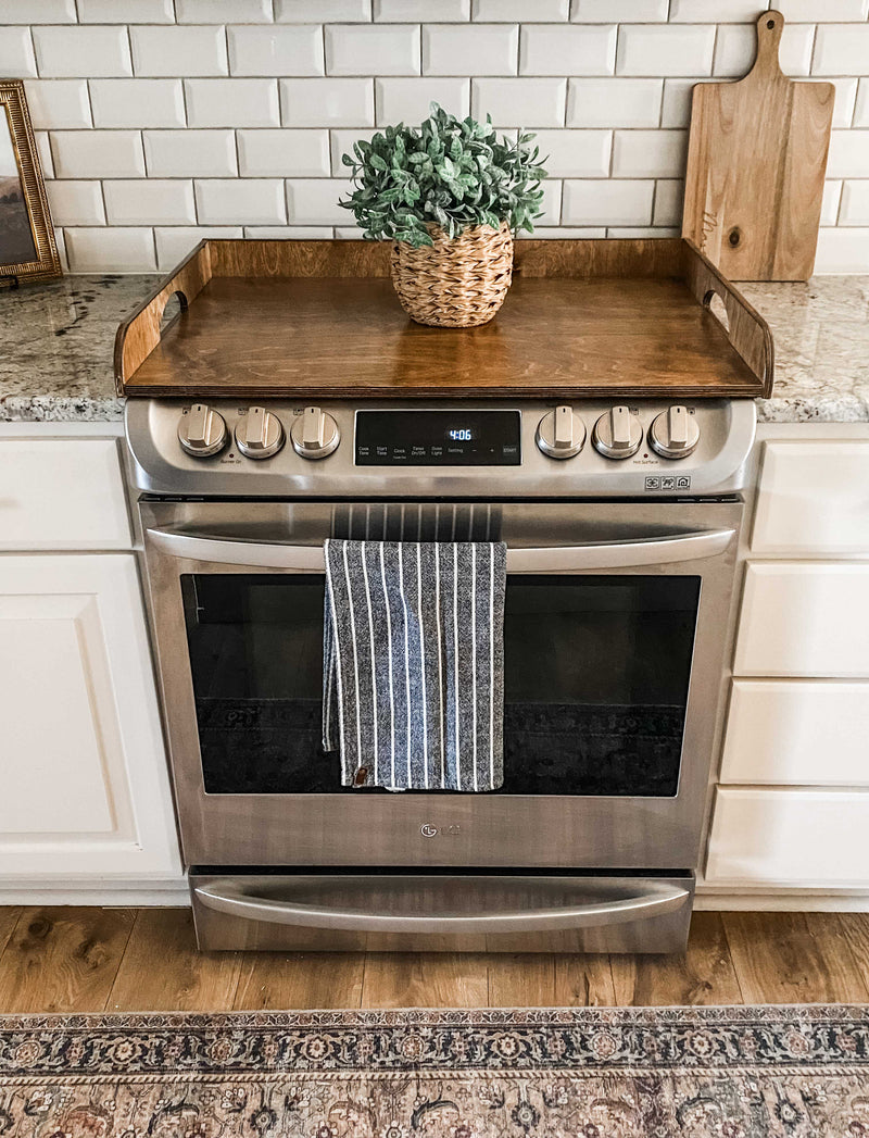Clean and simple warm brown stove cover with raised edge