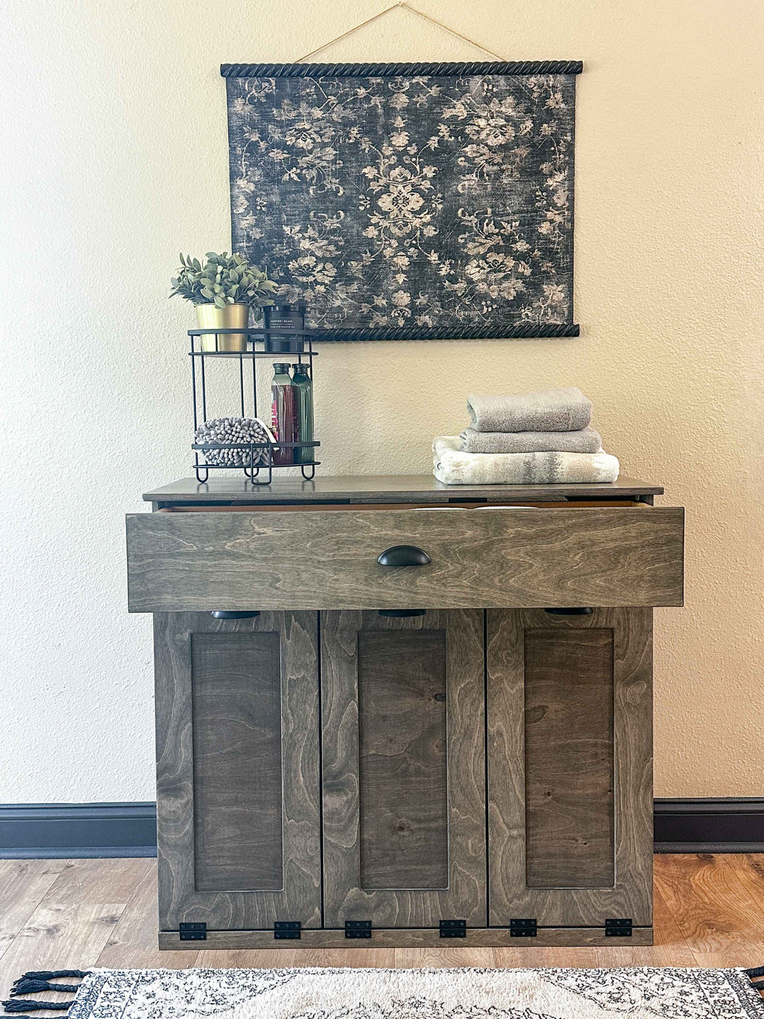 Slim laundry with a storage drawer in aged barrel stain