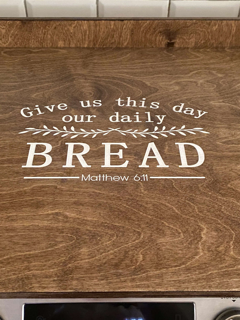 Warm brown stove cover: Daily Bread prayer