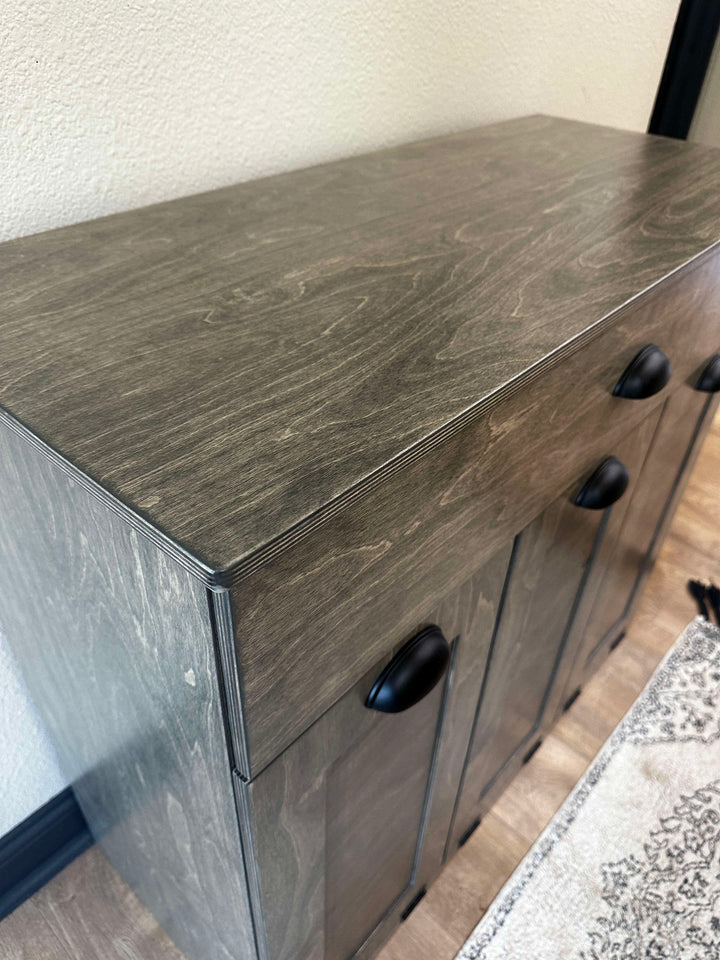 Slim laundry with a storage drawer in aged barrel stain