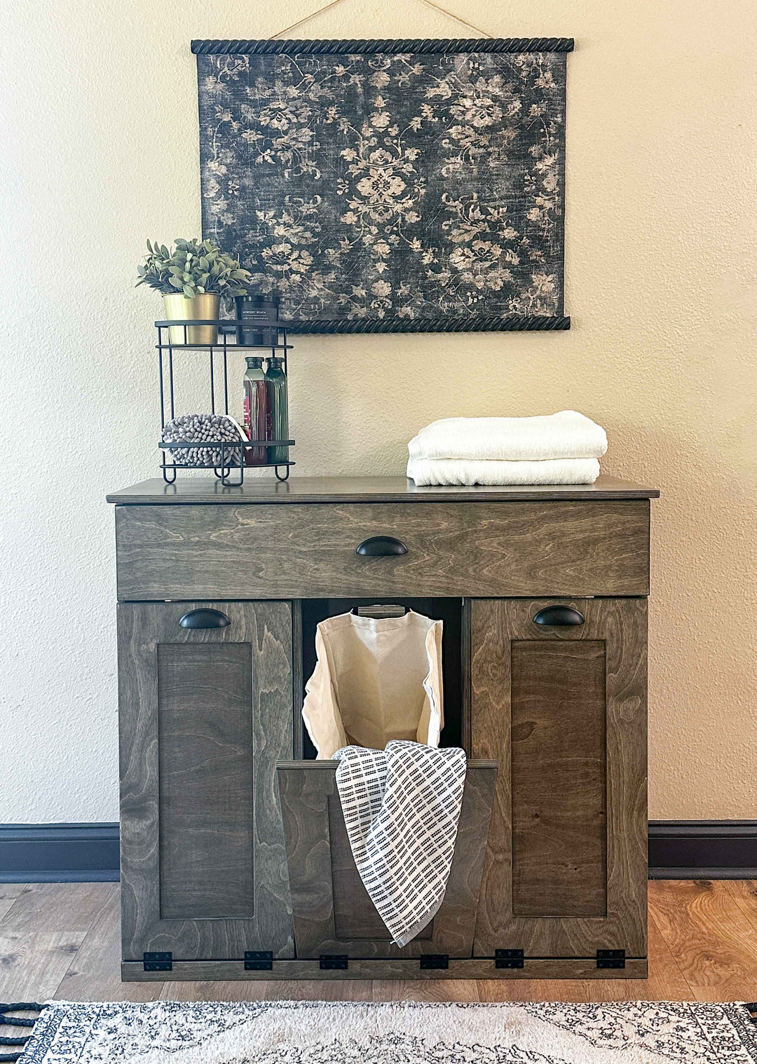 Slim laundry with a storage drawer in aged barrel stain