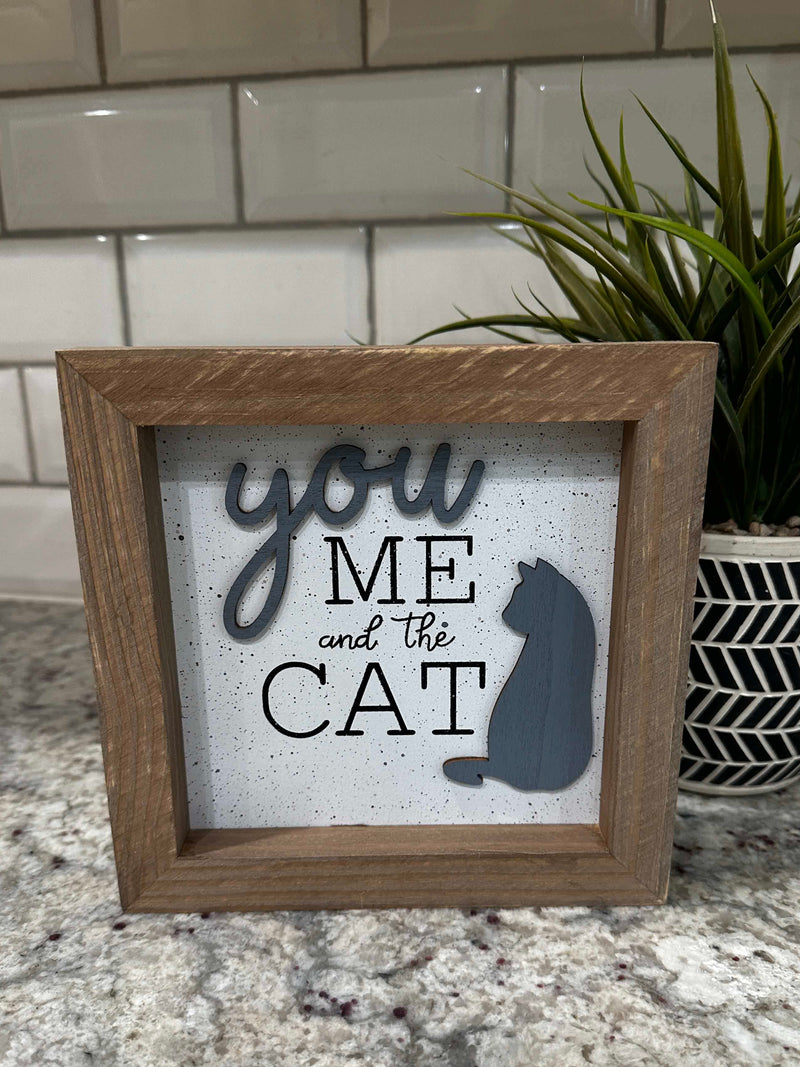 You me and the cat box sign