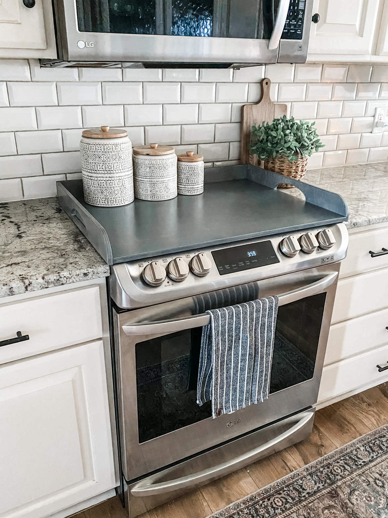 Clean and simple heather gray stove cover with raised edge