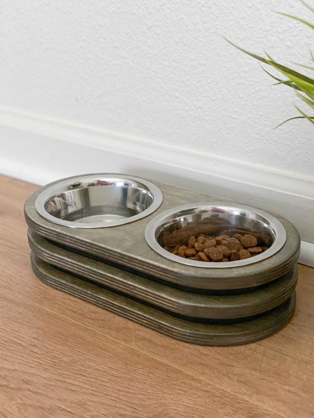 Two bowl stained layered wood elevated cat feeder