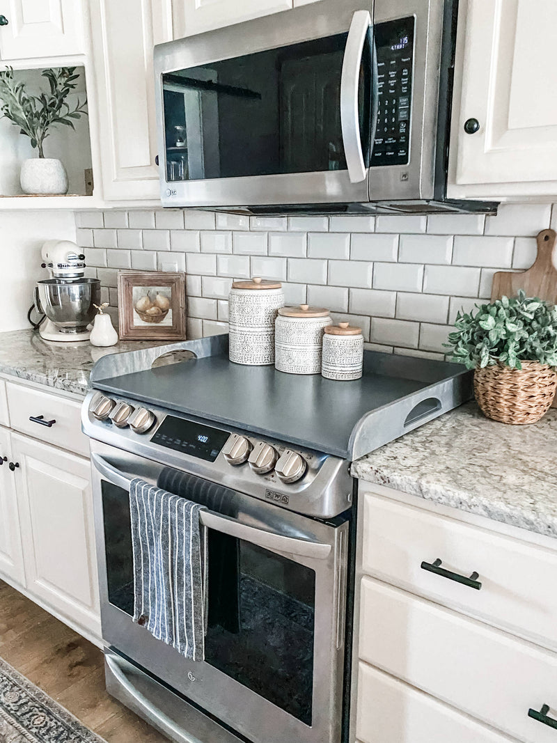 Clean and simple heather gray stove cover with raised edge