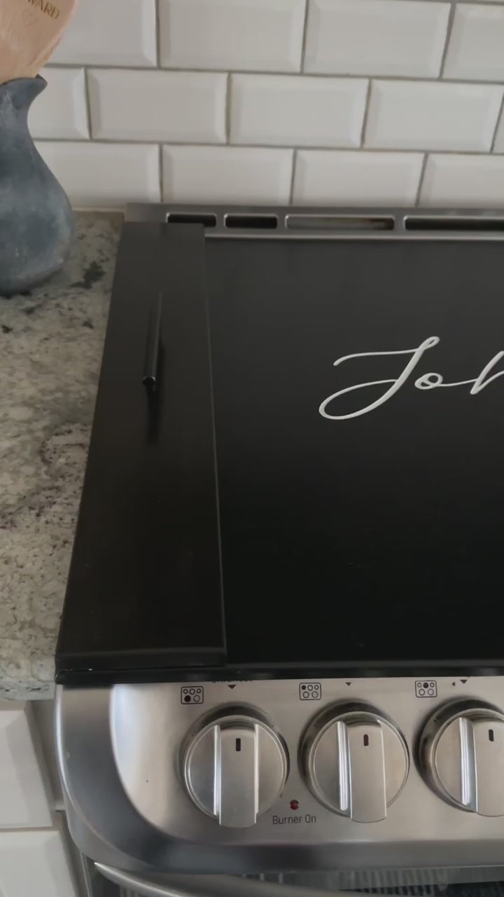 Personalized last name + est. date stove cover, black stain, "Johnson"