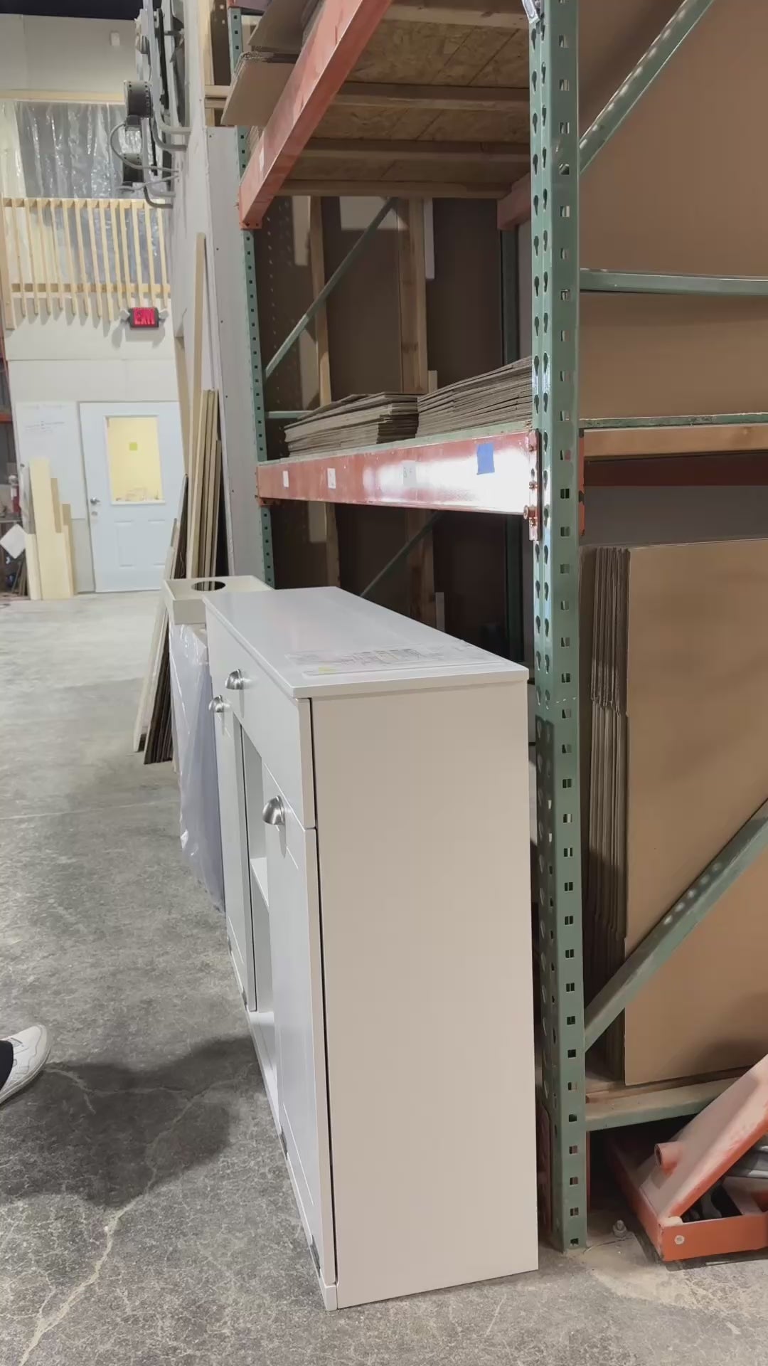 Triple laundry with a storage drawer and open shelving in white