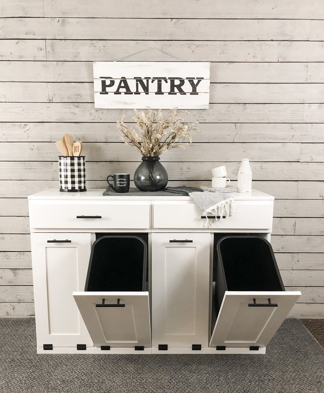 Furniture style slim style quad trash cabinet with a storage drawer in white