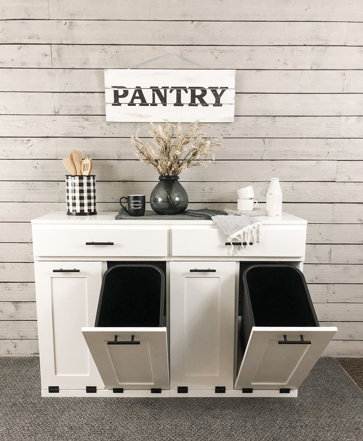 Furniture style slim style quad trash cabinet with a storage drawer in white