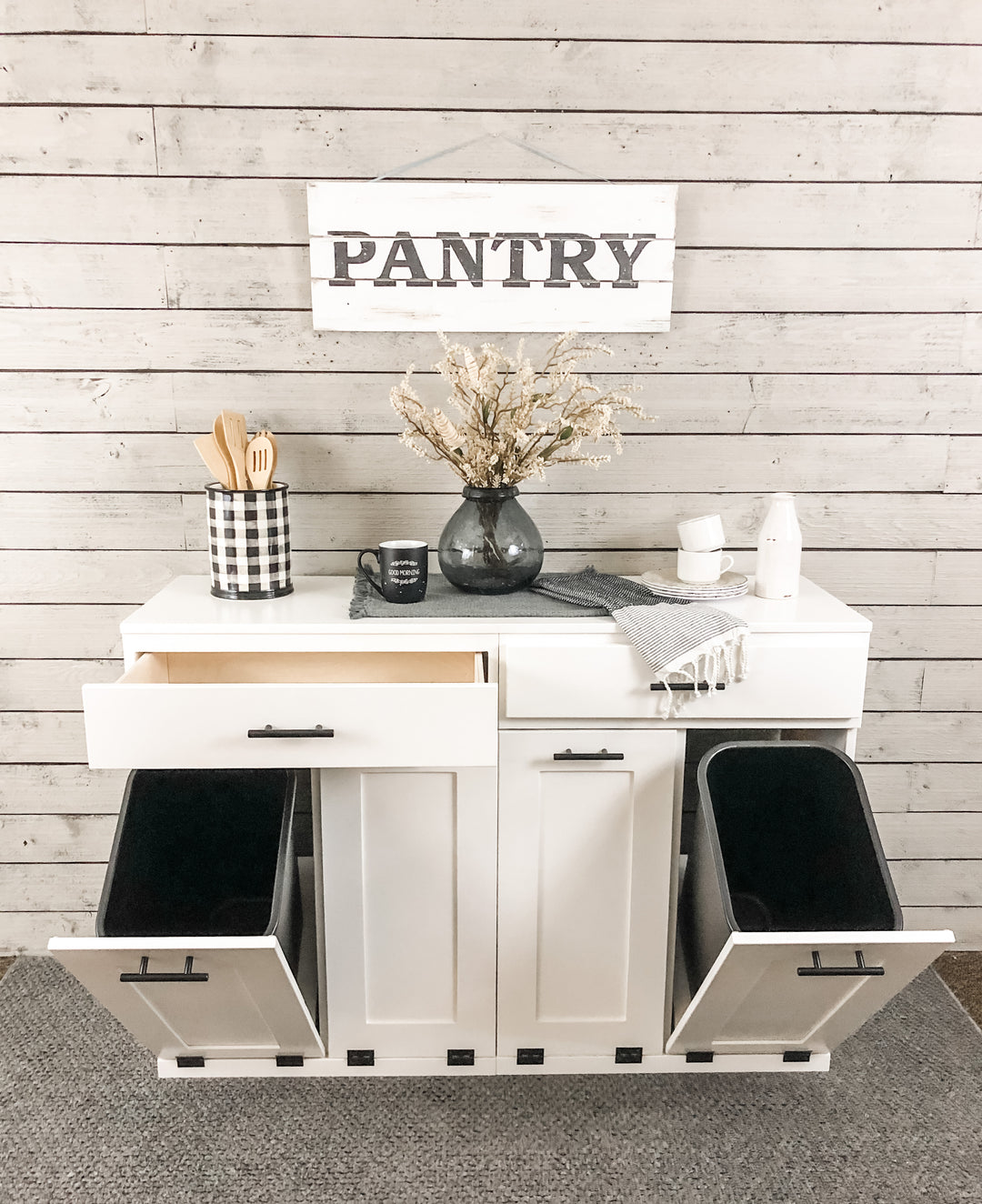 Furniture style slim style quad trash cabinet with a storage drawer in white