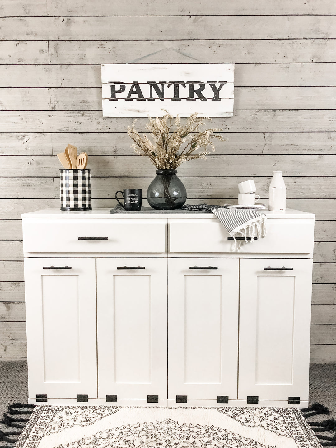 Furniture style slim style quad trash cabinet with a storage drawer in white