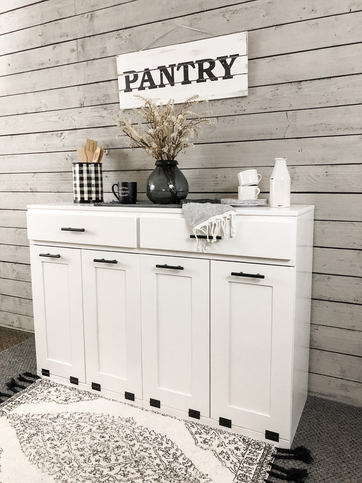 Furniture style slim style quad trash cabinet with a storage drawer in white