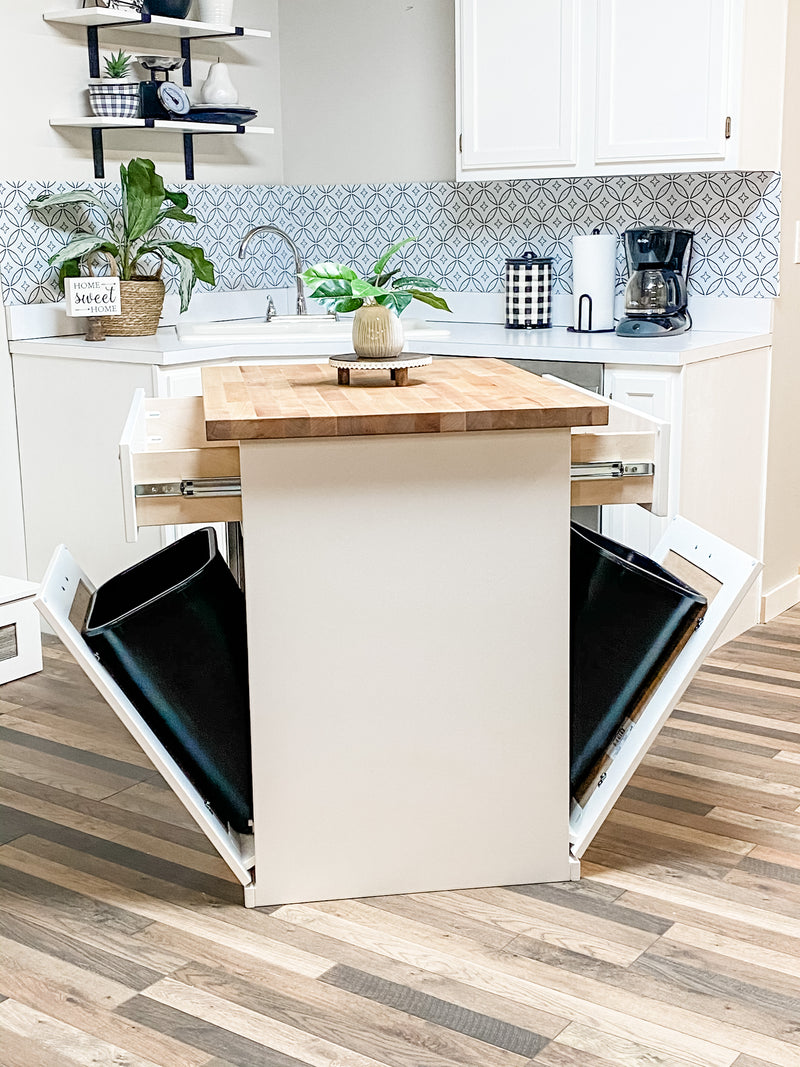 Island in white with a butcher block top