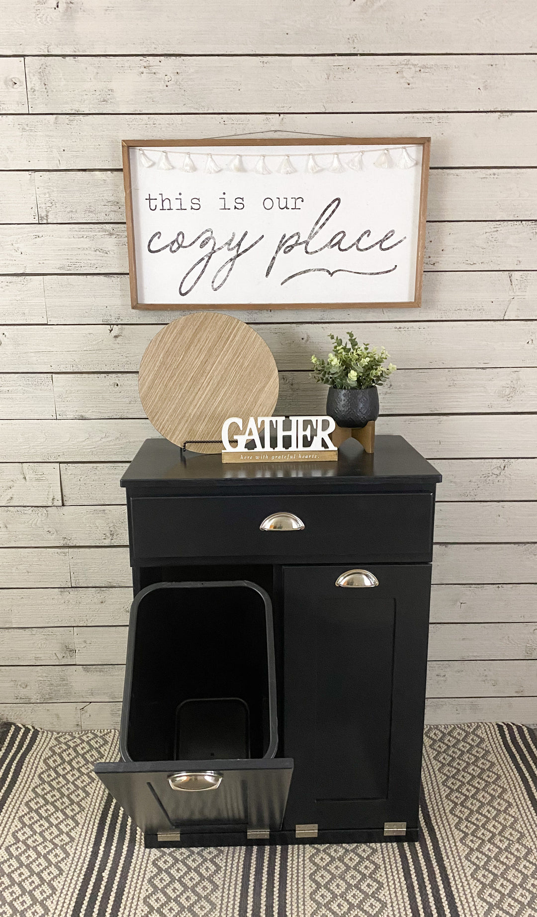 Slim style double trash cabinet with a storage drawer in black stain