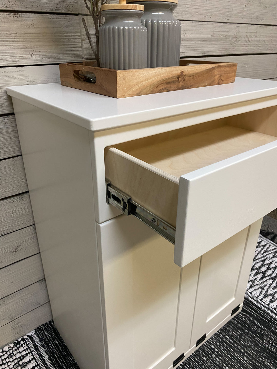 Narrow double cabinet to hide trash with a storage drawer in white