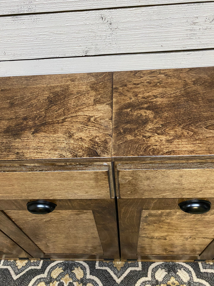 Quad laundry with a storage drawer in warm brown stain