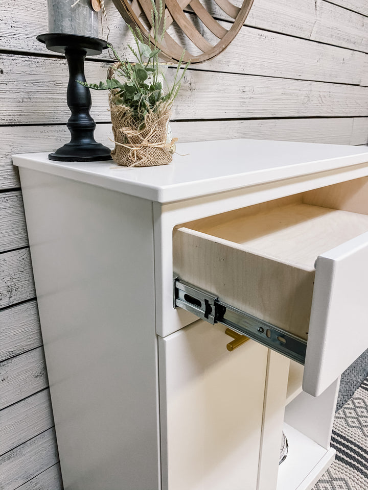 Barlow with a storage drawer and open shelving in white