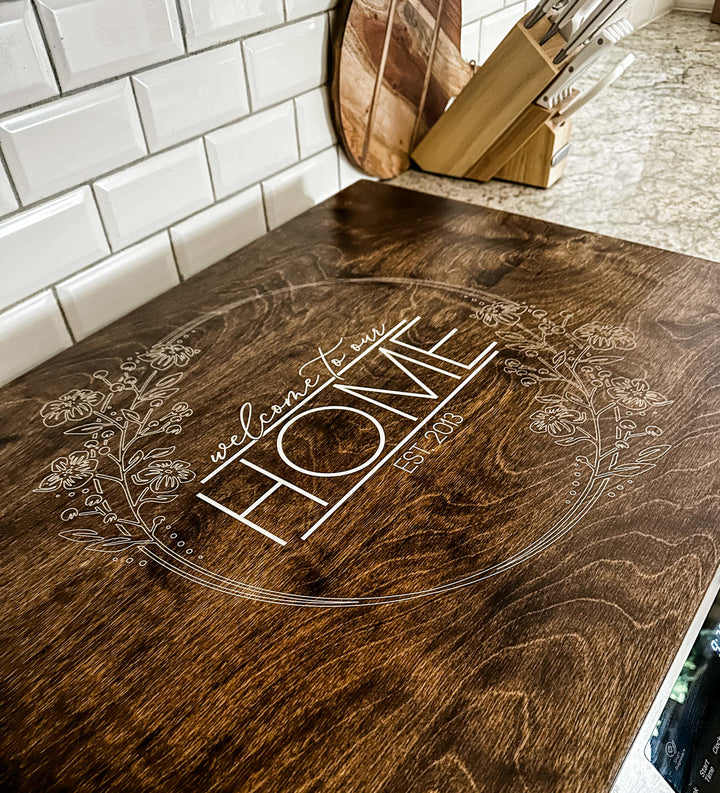 Personalized "welcome to our home" stove cover, warm brown + soft white