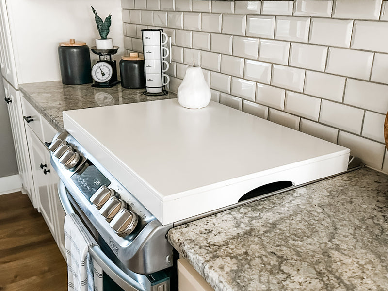 Clean and simple soft white stove cover. Minimalist design