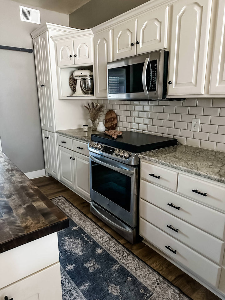 Clean and simple minimalist black stove cover